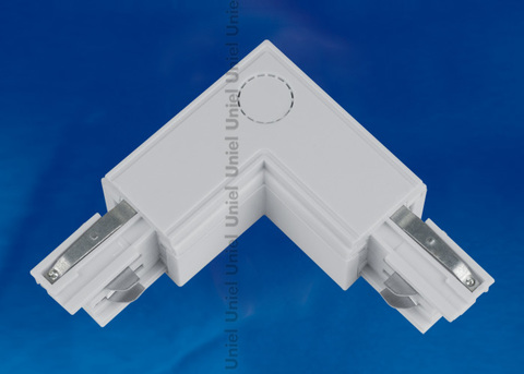 UBX-A22 SILVER 1 POLYBAG Соединитель для шинопроводов L-образный. Внутренний. Трехфазный. Цвет — серебряный. Упаковка — полиэтиленовый пакет.
