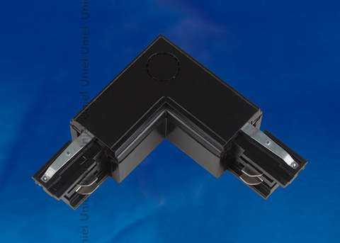 UBX-A22 BLACK 1 POLYBAG Соединитель для шинопроводов L-образный. Внутренний. Трехфазный. Цвет — черный. Упаковка — полиэтиленовый пакет.