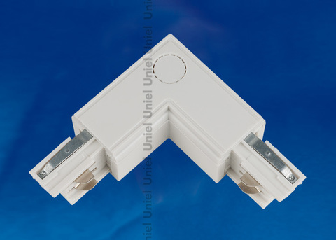 UBX-A22 WHITE 1 POLYBAG Соединитель для шинопроводов L-образный. Внутренний. Трехфазный. Цвет — белый. Упаковка — полиэтиленовый пакет.