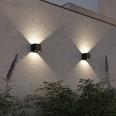 SL9513.401.01 Светильник уличный настенный ST-Luce черный/черный LED 1*10W 2700K